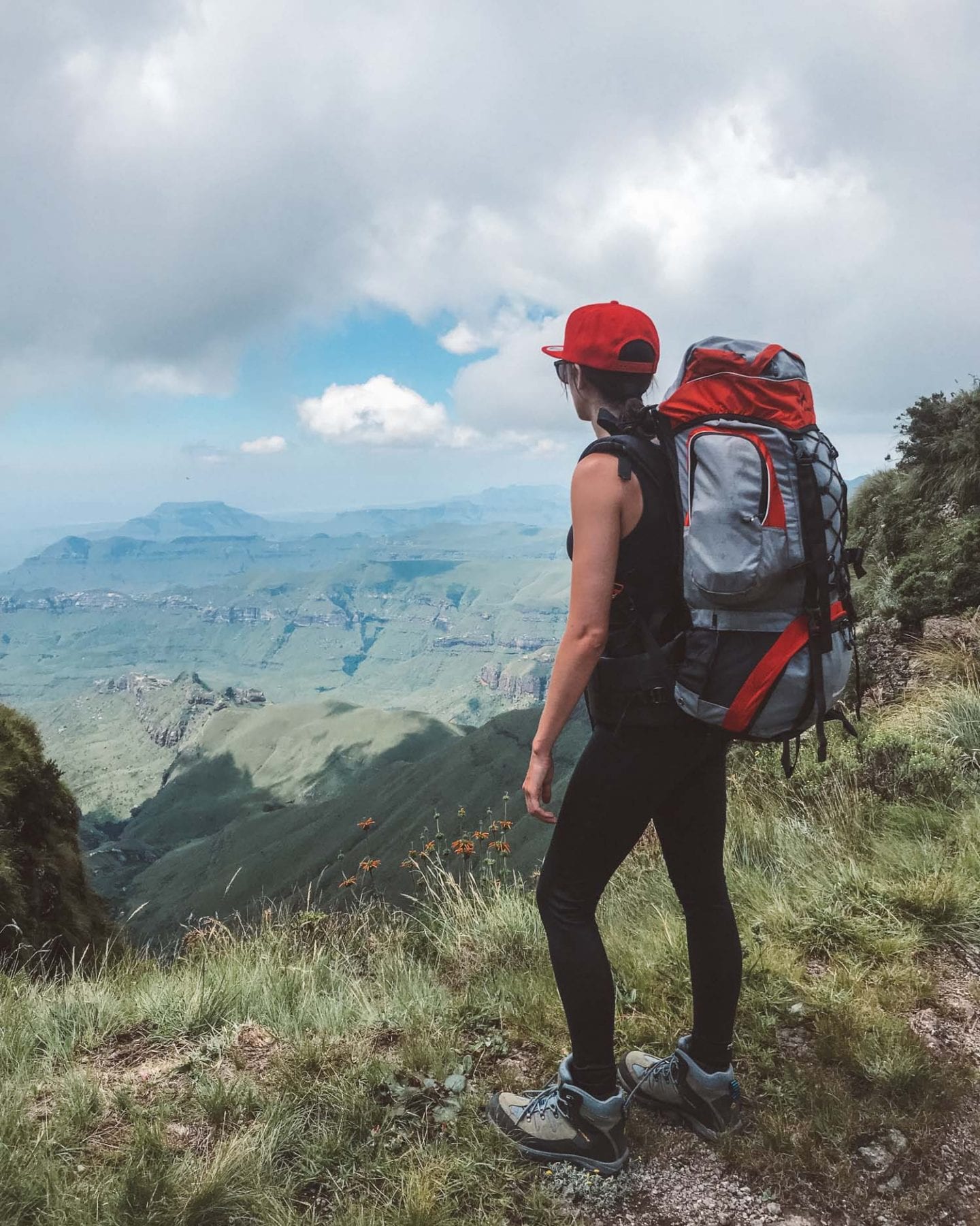 girl hiking up mountain