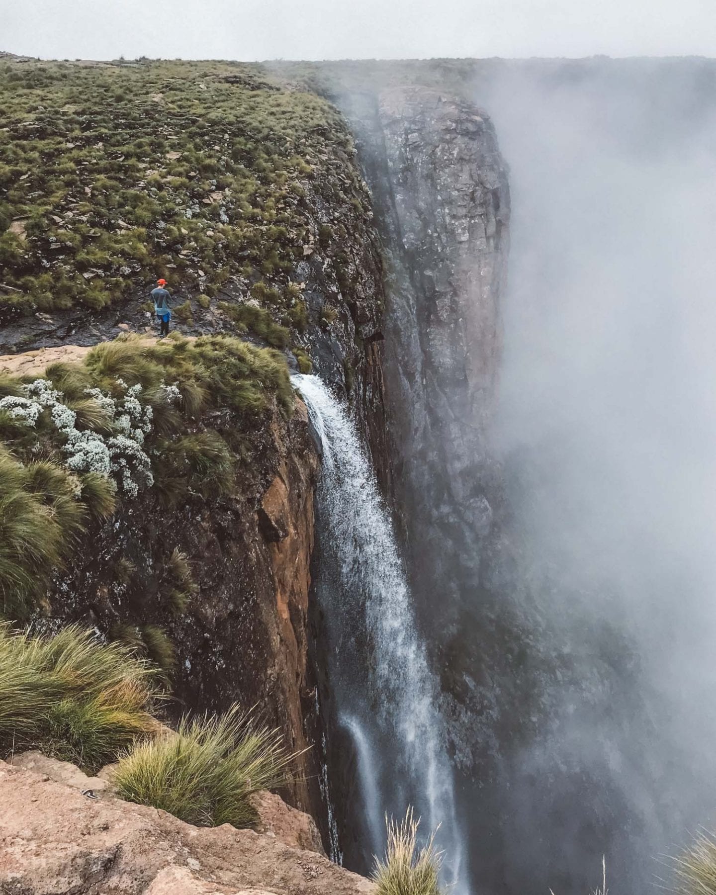 man on top of tugela falls