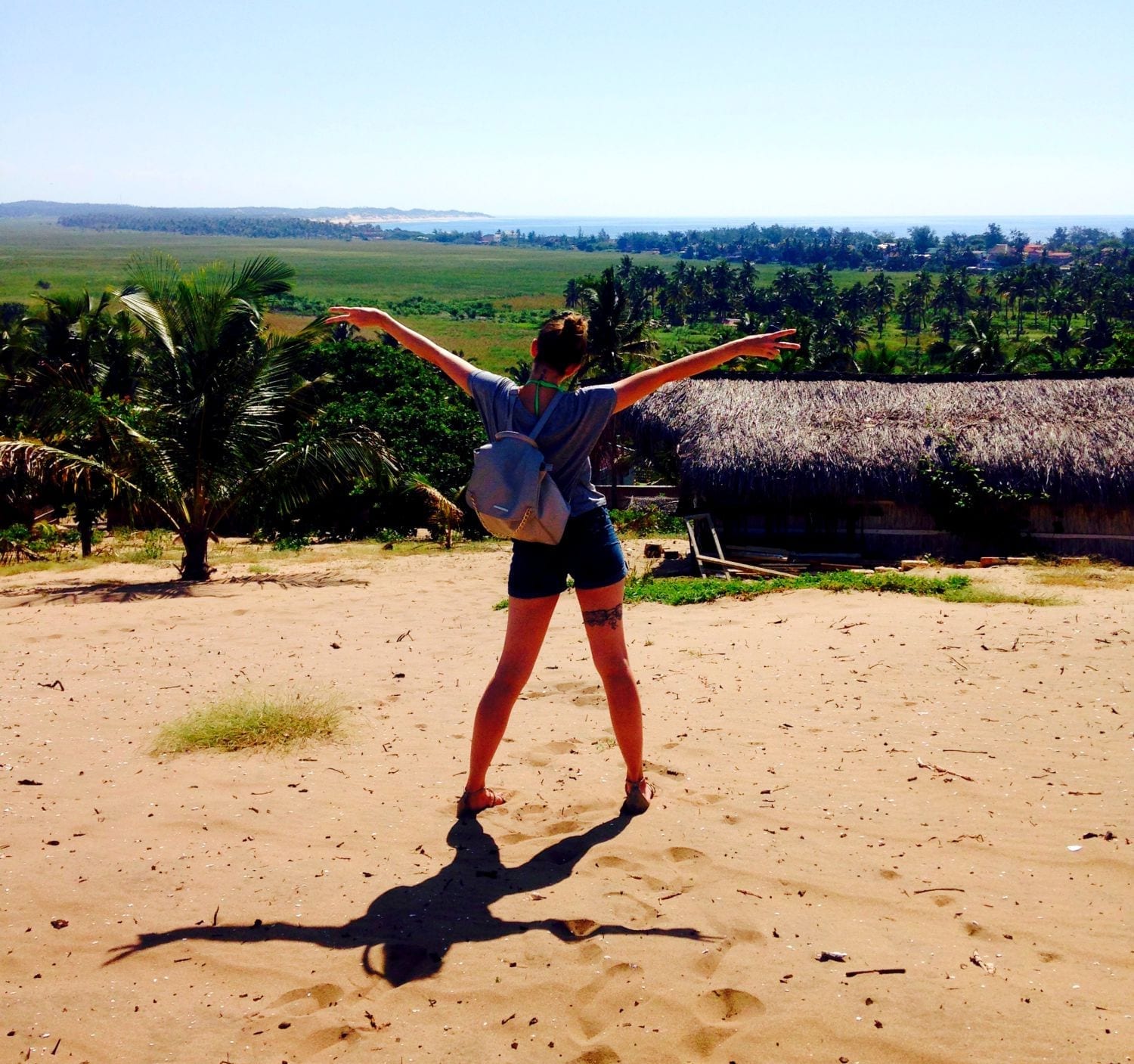 Climbing sand dunes on the way to the beach. Photo by: Angelo Dias