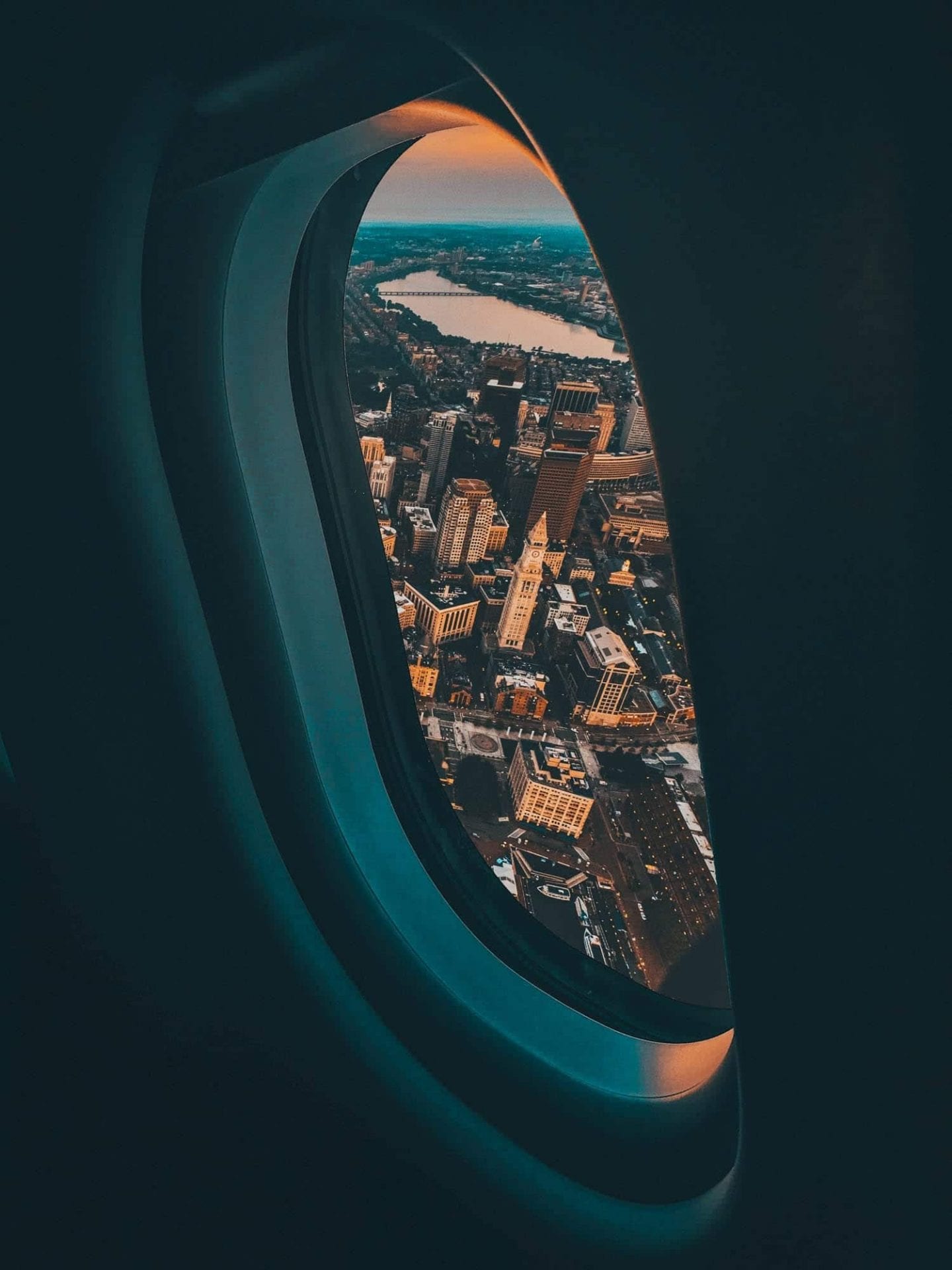 window seat in a plane overlooking nyc