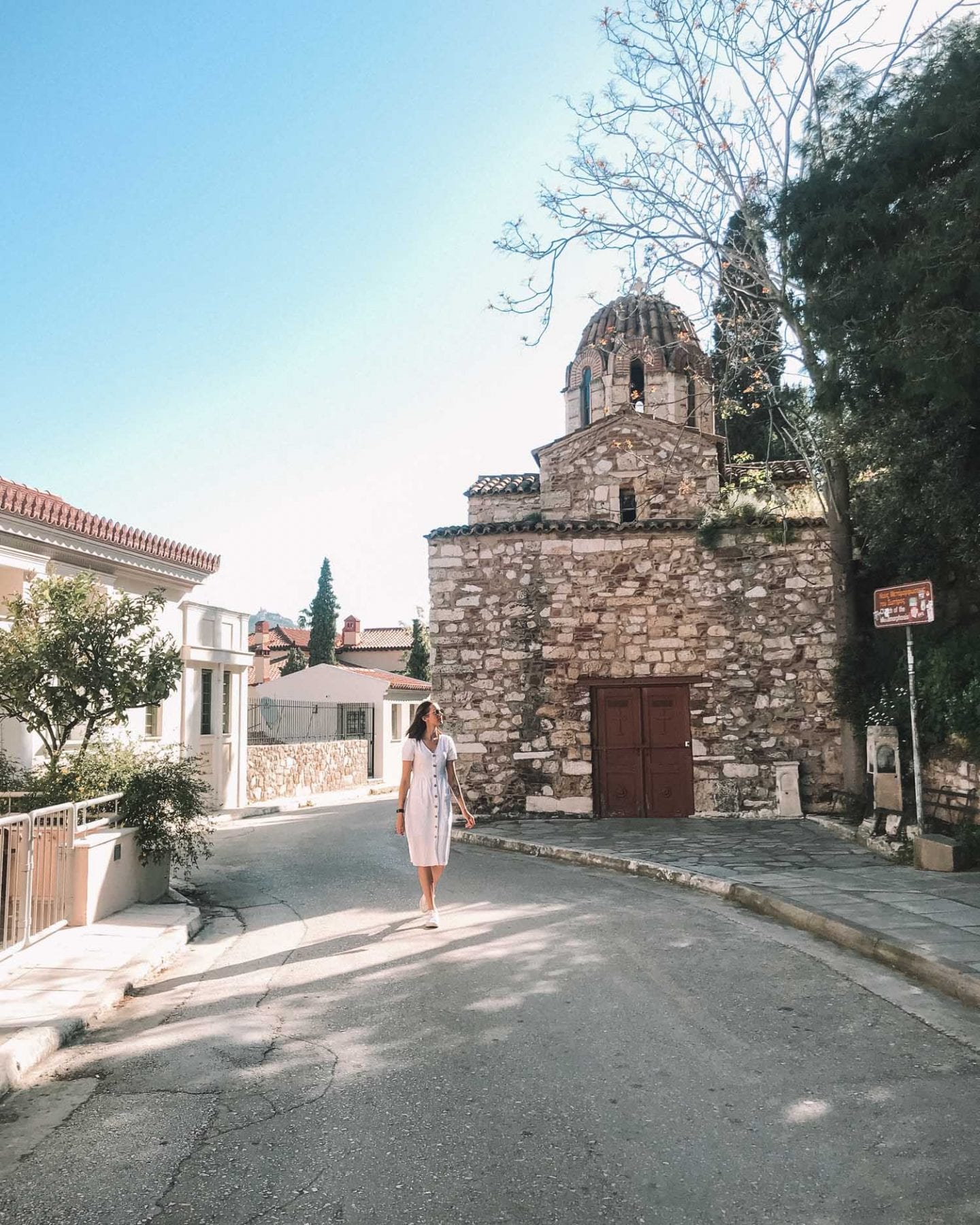 girl walking around plaka in athens