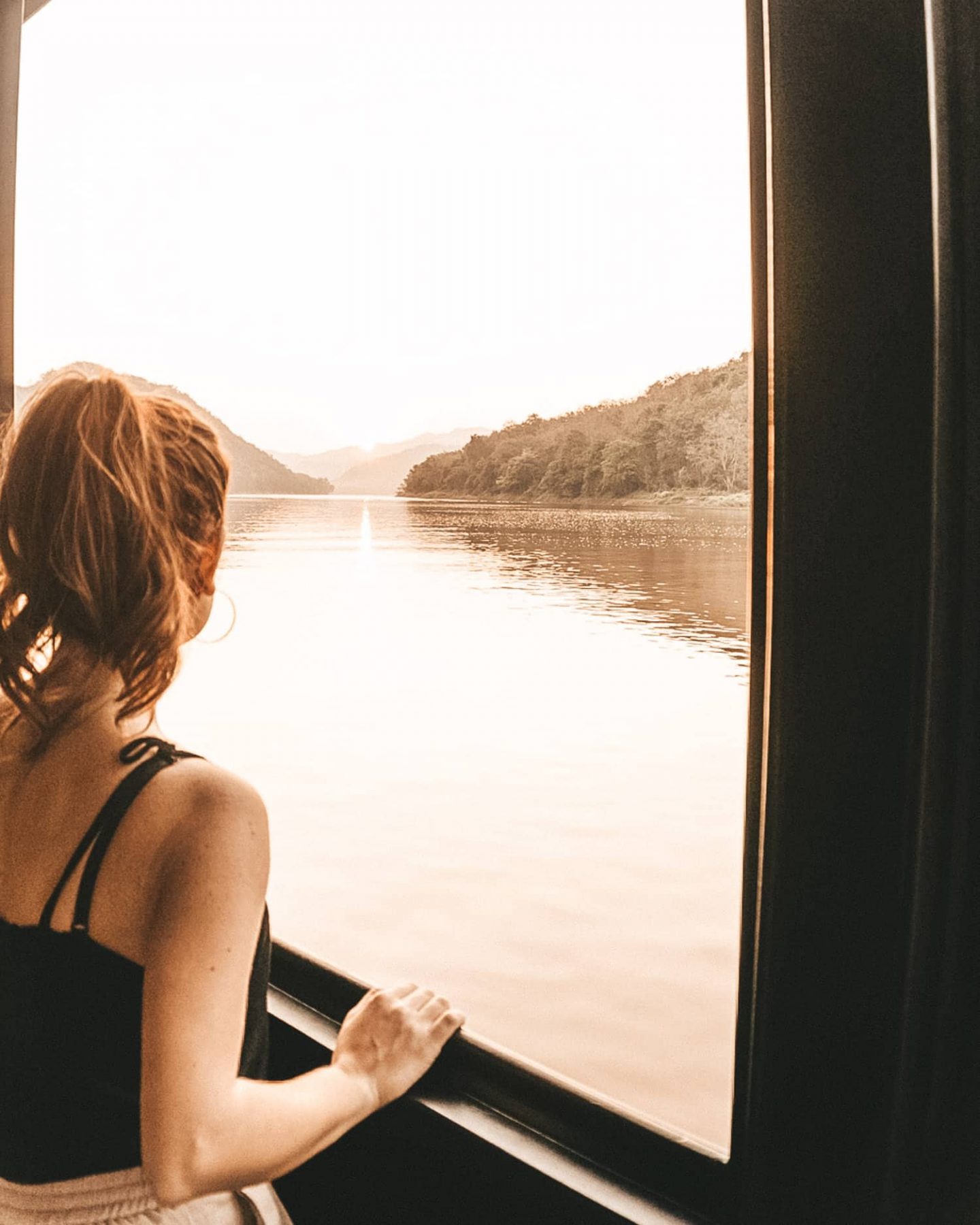 sunset cruise along the mekong