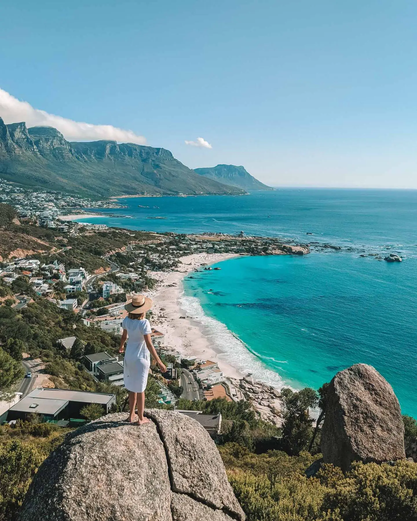 girl looking over camps bay