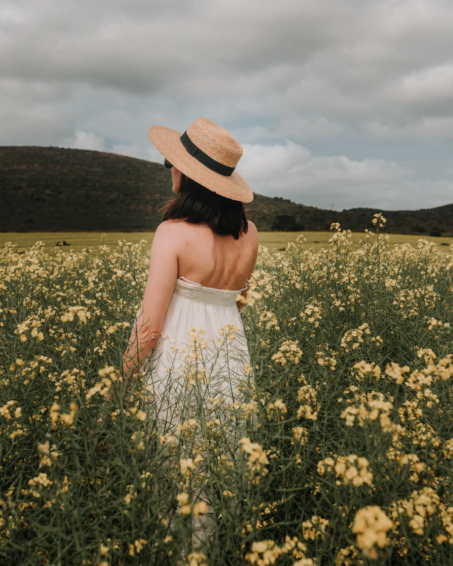 girl standing in canola field in cape town