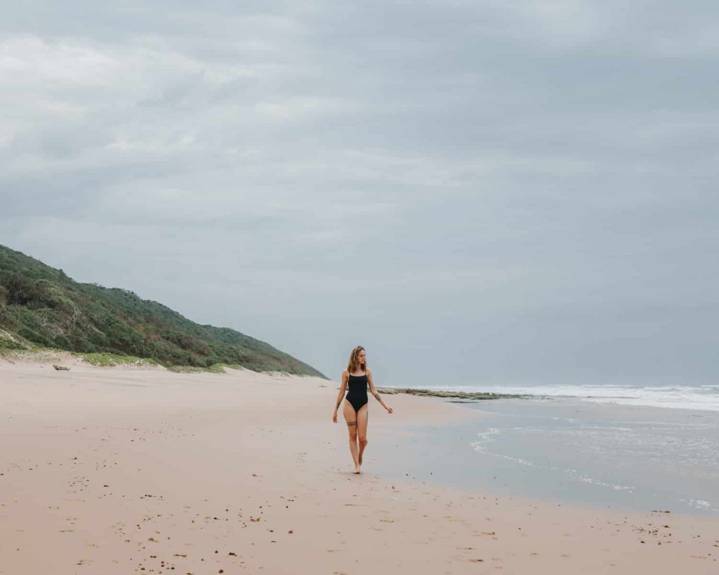 girl at mission rocks beach in south africa