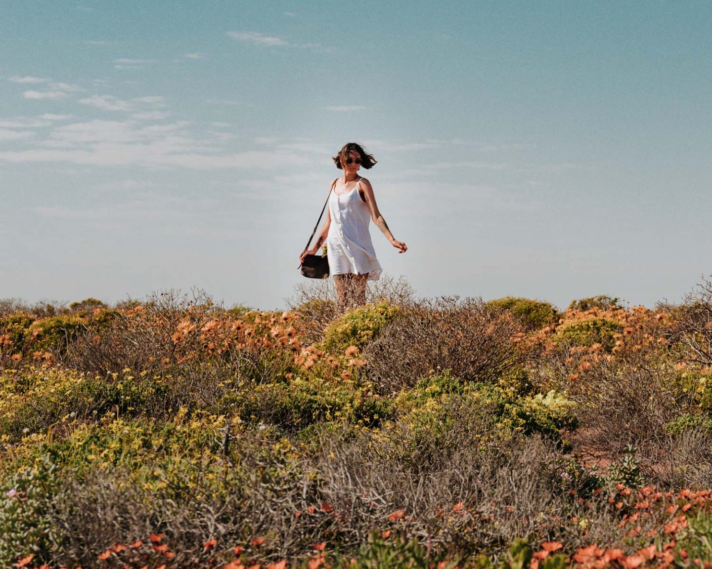 girl in namaqualand flowers