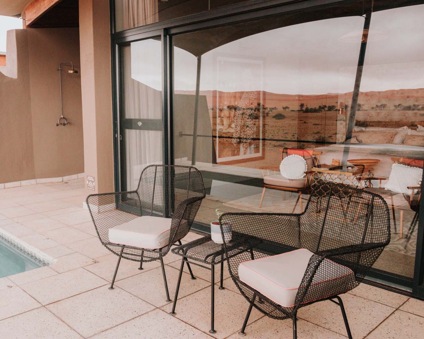 private patio with a pool