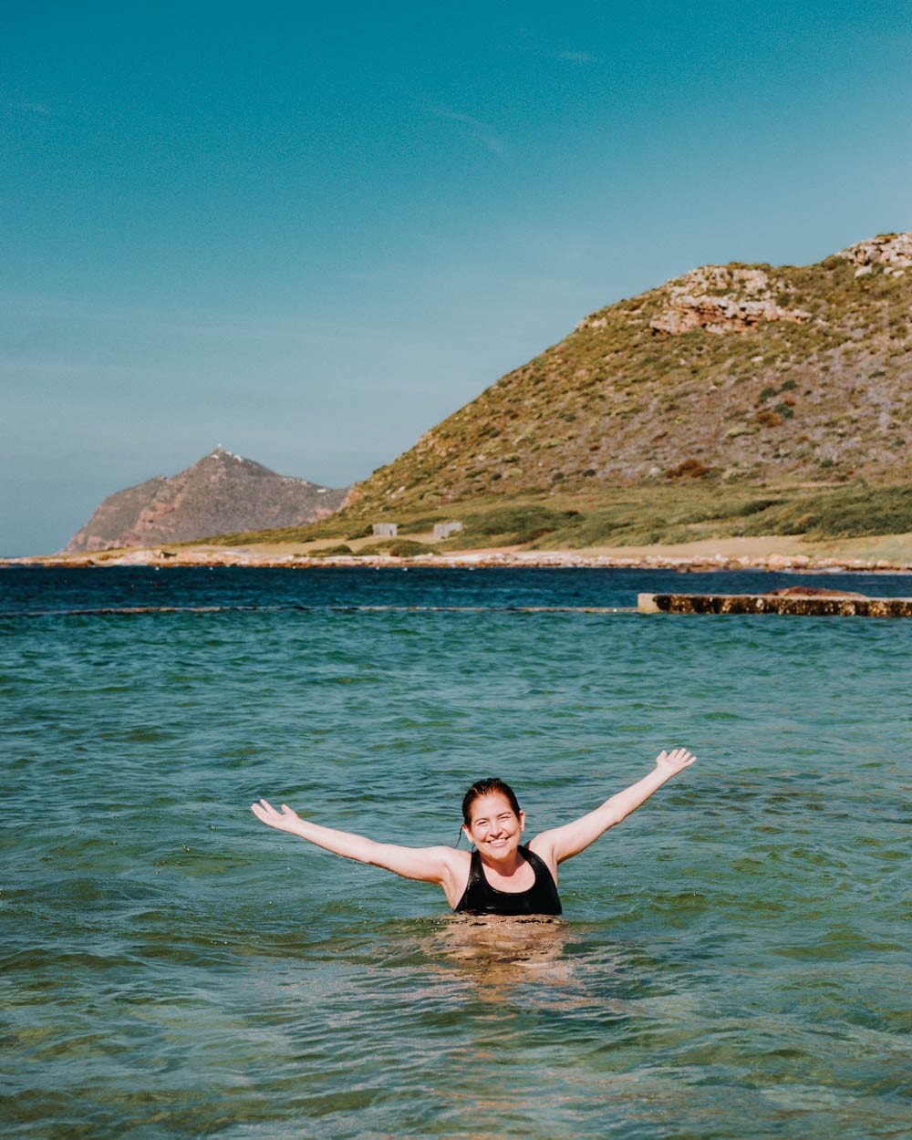 girl swimming in tidal pool in south africa