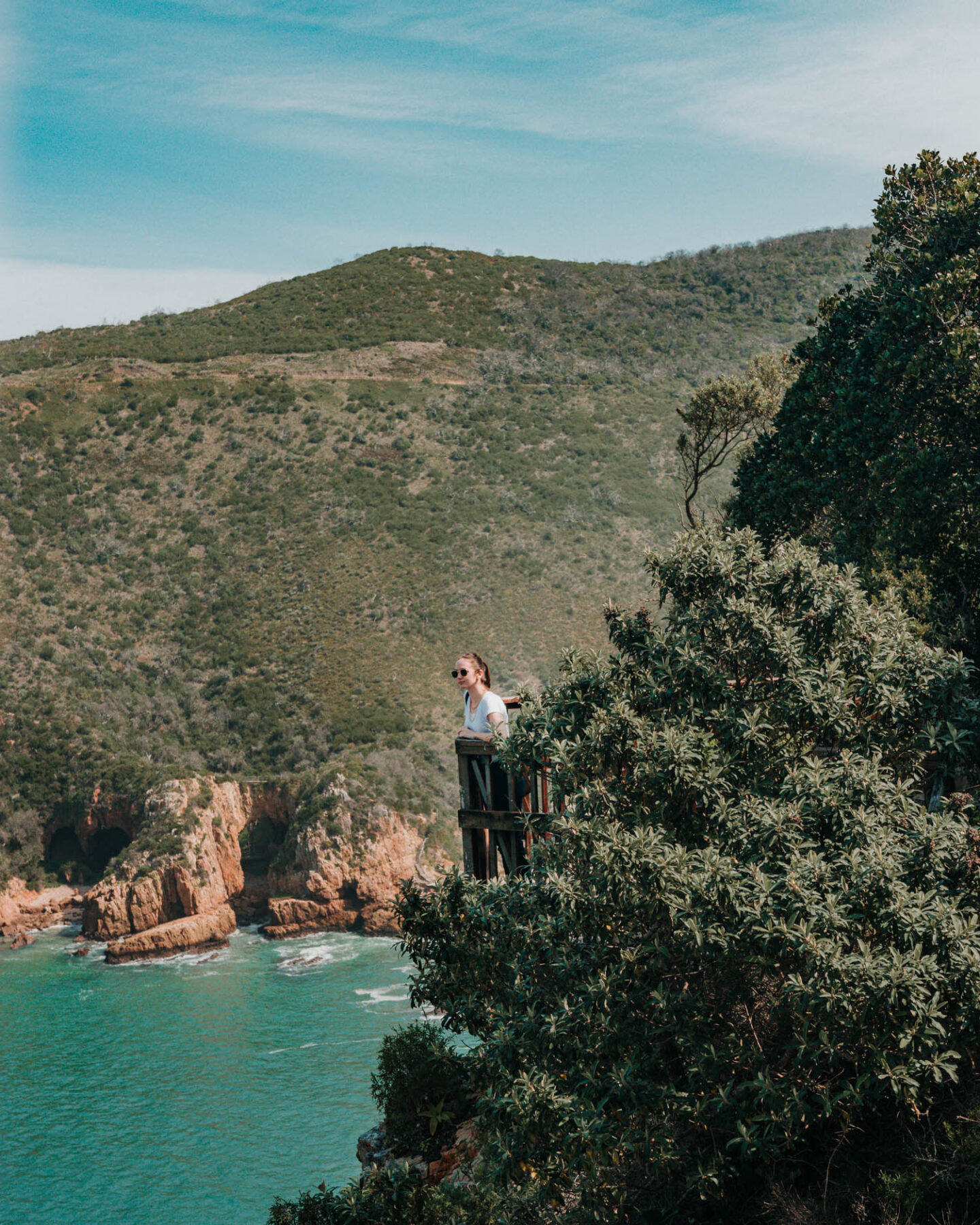 girl standing at view point at knysna heads