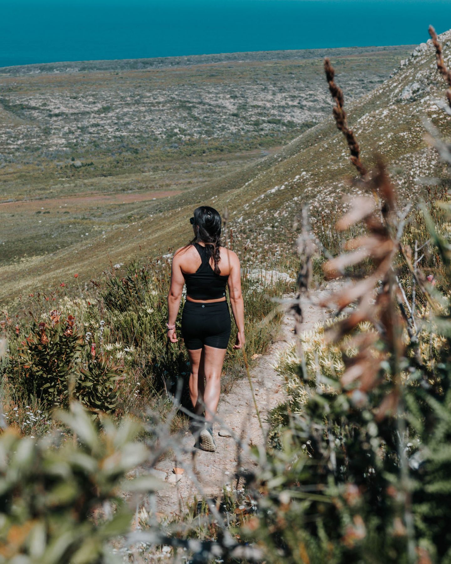 girl walking on a hiking path