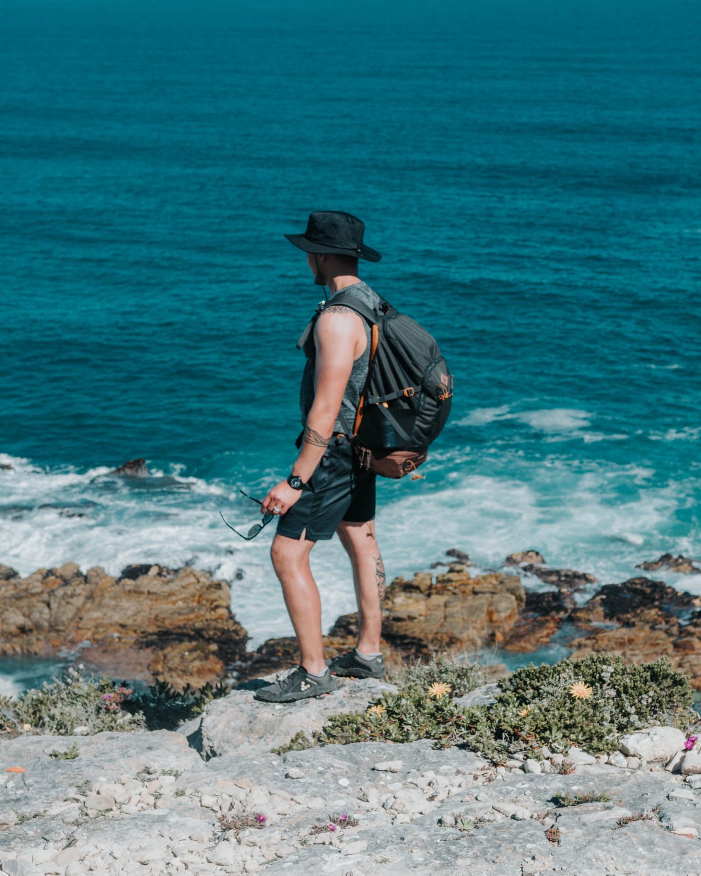 man standing on a rock-