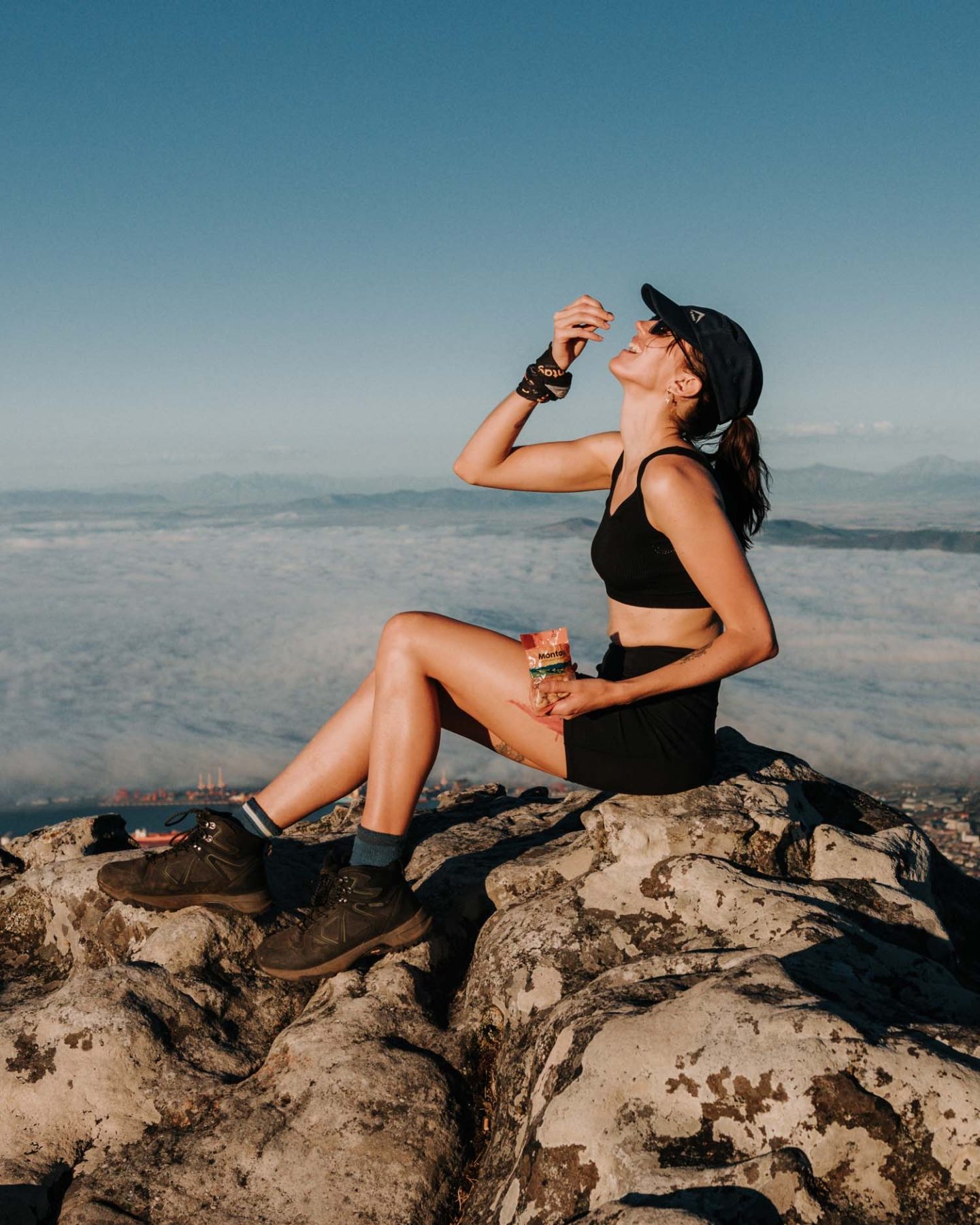 lauren on top of table mountain eating snacks