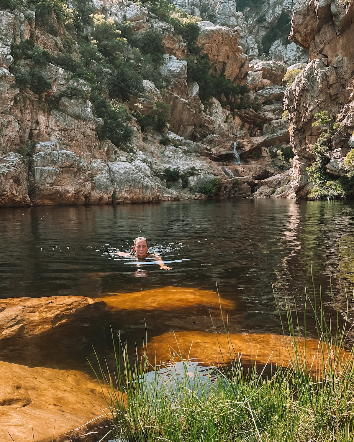 woman swimming at crystal pools
